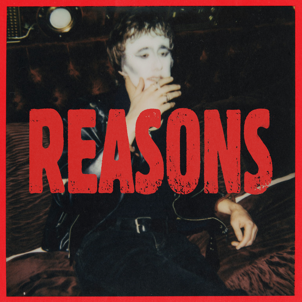 Single cover artwork for Reasons by The Grogans featuring a person with white face makeup wearing a leather jacket under red text.
